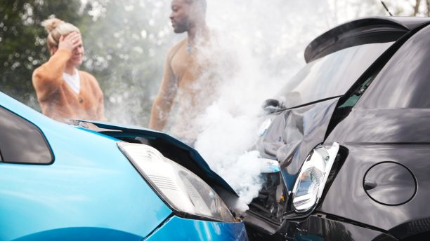 Two Angry Motorists Arguing Over Responsibility For Car Accident